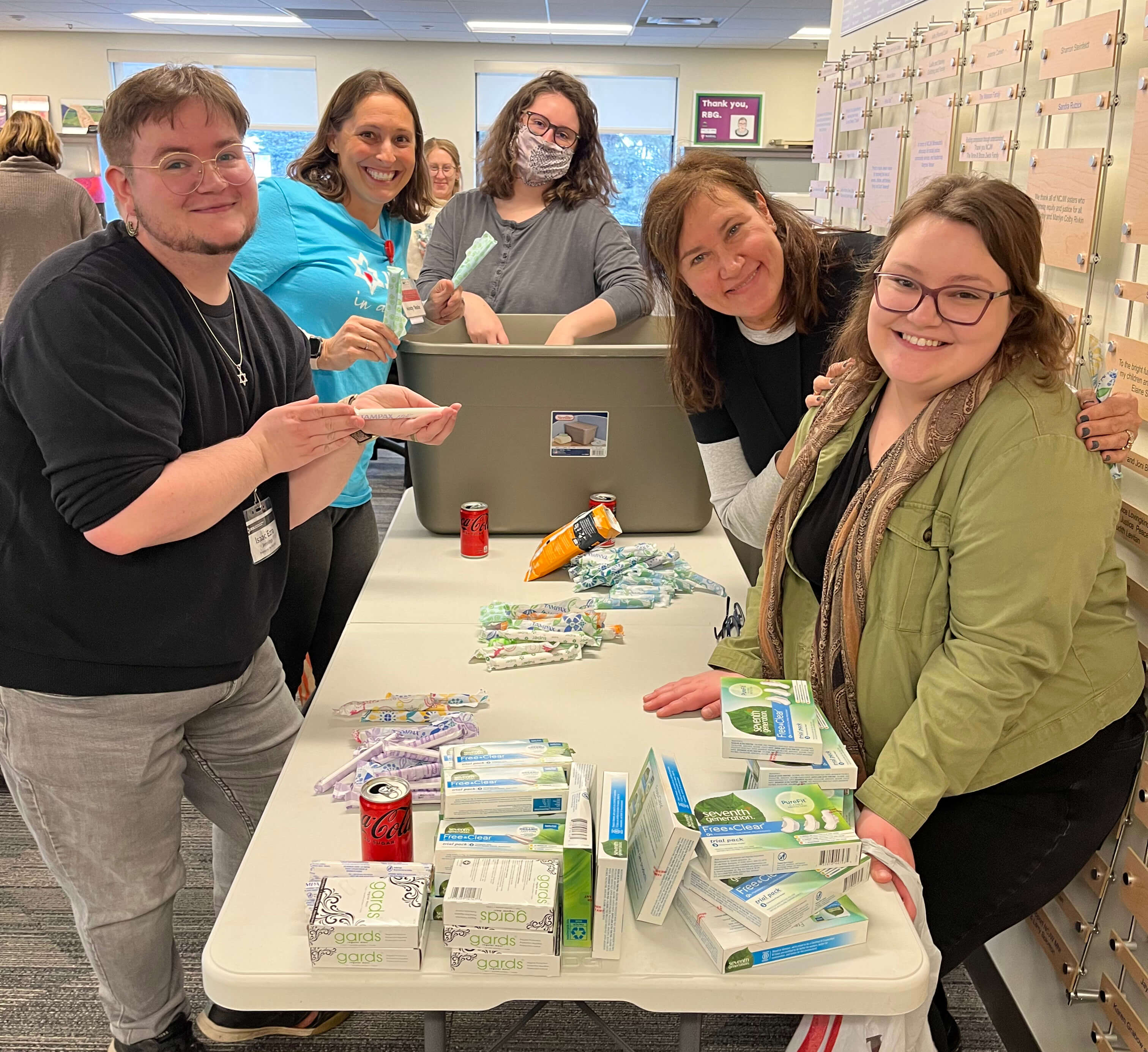 JFCS staff lend a hand to one of our neighbors for this year’s MLK Day of Service volunteer project